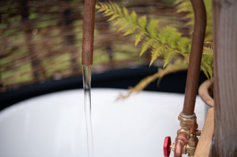 Bath tap running 768x511